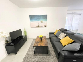 Grand Appartement lumineux & spacieux avec jardin